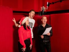 Mark Hoyle, known as Ladbaby, and his wife Roxanne, with MoneySavingExpert’s Martin Lewis, during the recording of Ladbaby’s latest single Food Aid, a reworking of the Band Aid song Do They Know It’s Christmas? in a bid to claim their fifth consecutive Christmas number one (LadBaby/PA)