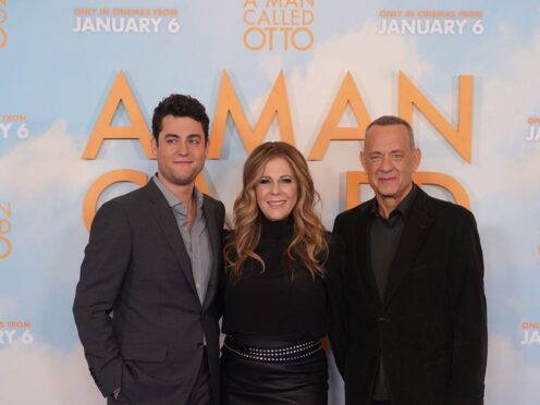 Tom Hanks with his wife, Rita Wilson and his son, Truman Hanks, during a photocall for A Man Called Otto at the Corinthia Hotel in London (Ian West/PA)
