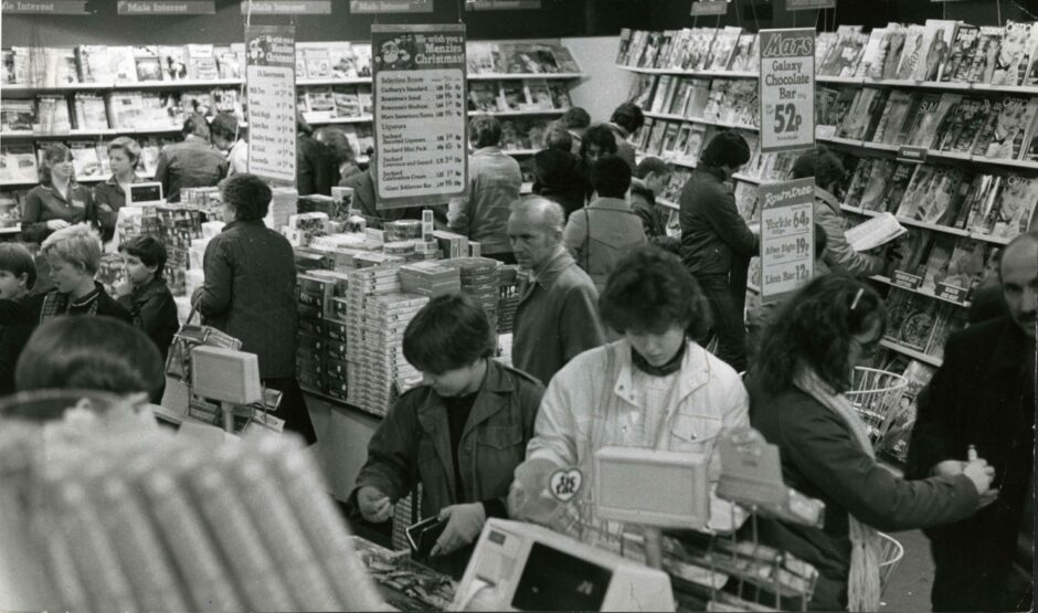 A packed John Menzies store in 1982.