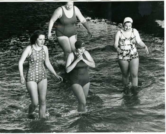 Members of the Amphibious Ancients Bathing Association braving the waters in January 1978.