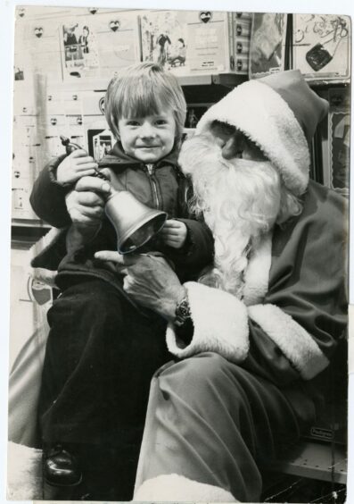 Michael Gallagher meets Father Christmas in 1978