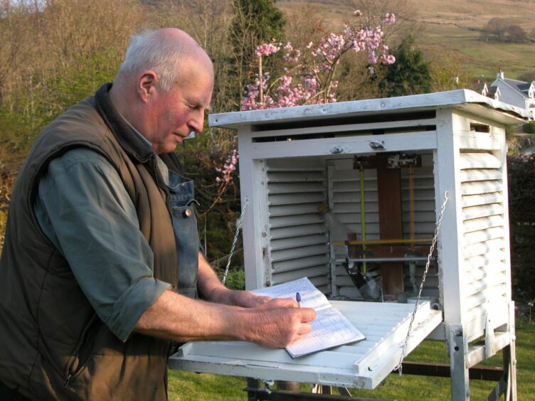 Mervyn Knox-Browne taking weather readings.