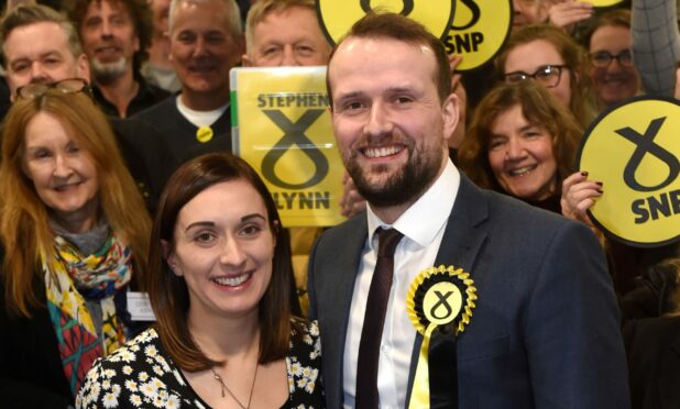 Stephen Flynn, with his wife Lynn, at the 2019 General Election vote count