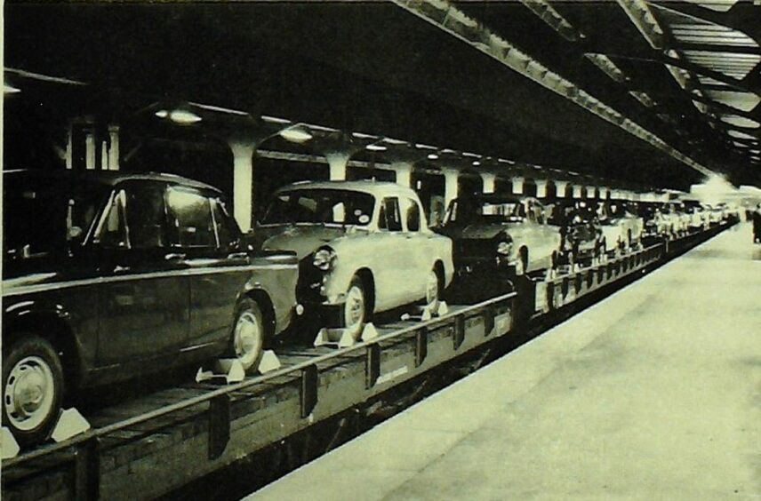 "Take the car the easy way": Vehicles loaded up and ready to go at a Motorail depot.