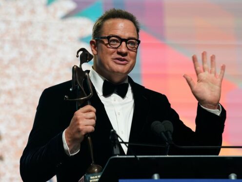 Brendan Fraser accepts the spotlight award for “The Whale” at the 34th annual Palm Springs International Film Festival Awards Gala on Thursday, Jan. 5, 2023, in Palm Springs, Calif. (AP Photo/Chris Pizzello)