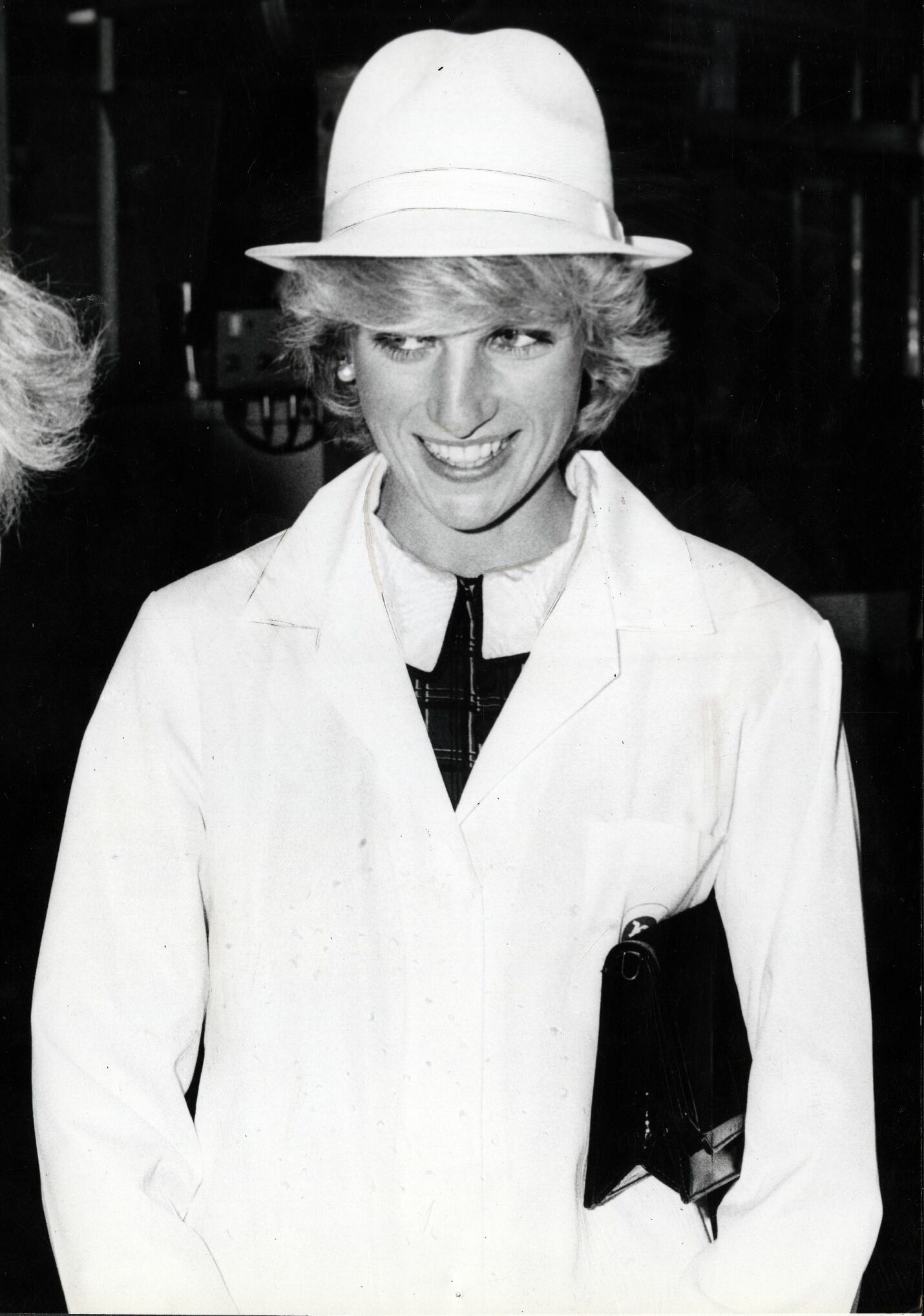 A smiling Princess Diana wearing the customary white coat and hat of Keiller's. Image: DC Thomson.