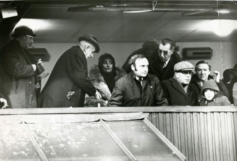 Rod Stewart pictured at Tannadice in his fur coat watching his beloved Celtic take on United. Image: DC Thomson.