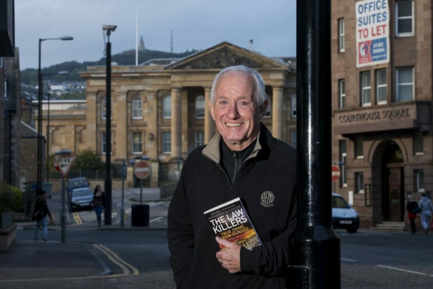 Author Alexander McGregor with his Law Killers book. 