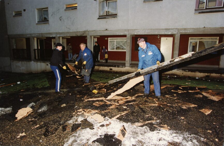 The roof was blown off a block of flats in Dundee's Whitfield estate during the extreme weather. Image: DC Thomson.