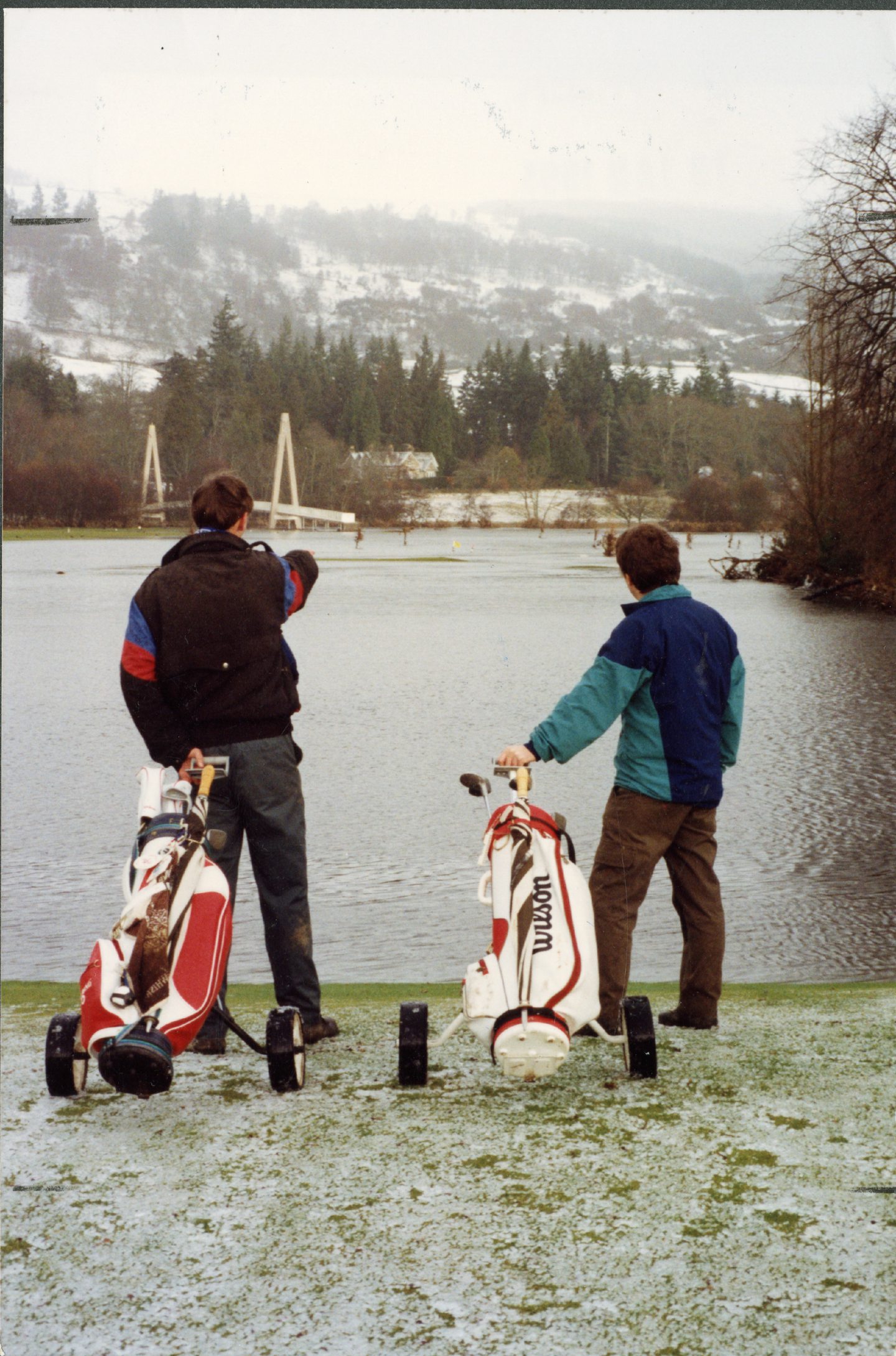 Golfers survey the flooded course at Aberfeldy after the Great Tay Flood. Image: DC Thomson.
