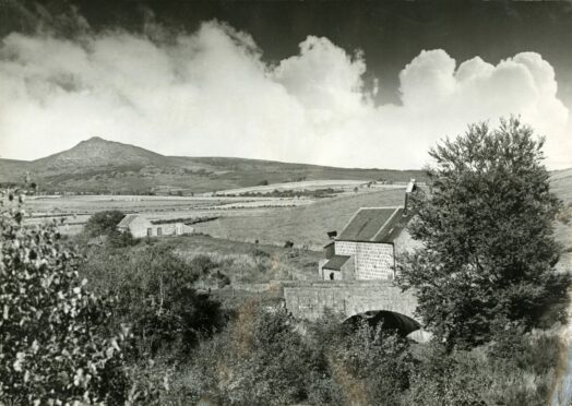 A rural view between Inverurie and Chapel of Garioch with Bennachie on the skyline in 1979
