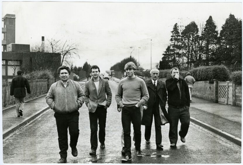 Some of the Timex workers leaving the Milton of Craigie factory in January 1983. Image: DC Thomson.
