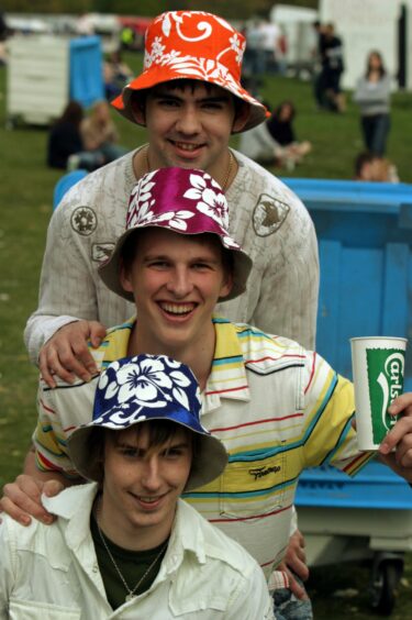 Thomas Gourlay, Ross McDonald and Colin Dow show off their headgear at the event.