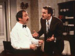 Andrew Sachs as Manuel and John Cleese as Basil in the BBC’s Fawlty Towers (PA)