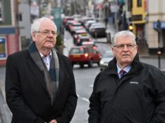 Omagh bomb campaigners Michael Gallagher (left) and Stanley McCombe on Campsie Street, Omagh, close to the site of the 1998 bombing. Northern Ireland Secretary Chris Heaton-Harris has said he intends to establish an independent statutory inquiry into the 1998 Omagh bombing (Oliver McVeigh/PA)