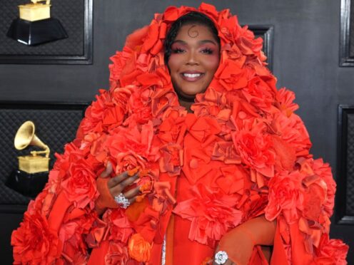 Lizzo arrives at the 65th annual Grammy Awards (Photo by Jordan Strauss/Invision/AP)