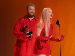 Kim Petras, right, and Sam Smith accept the award for best pop duo/group performance for “Unholy” at the 65th annual Grammy Awards on Sunday (AP Photo/Chris Pizzello)