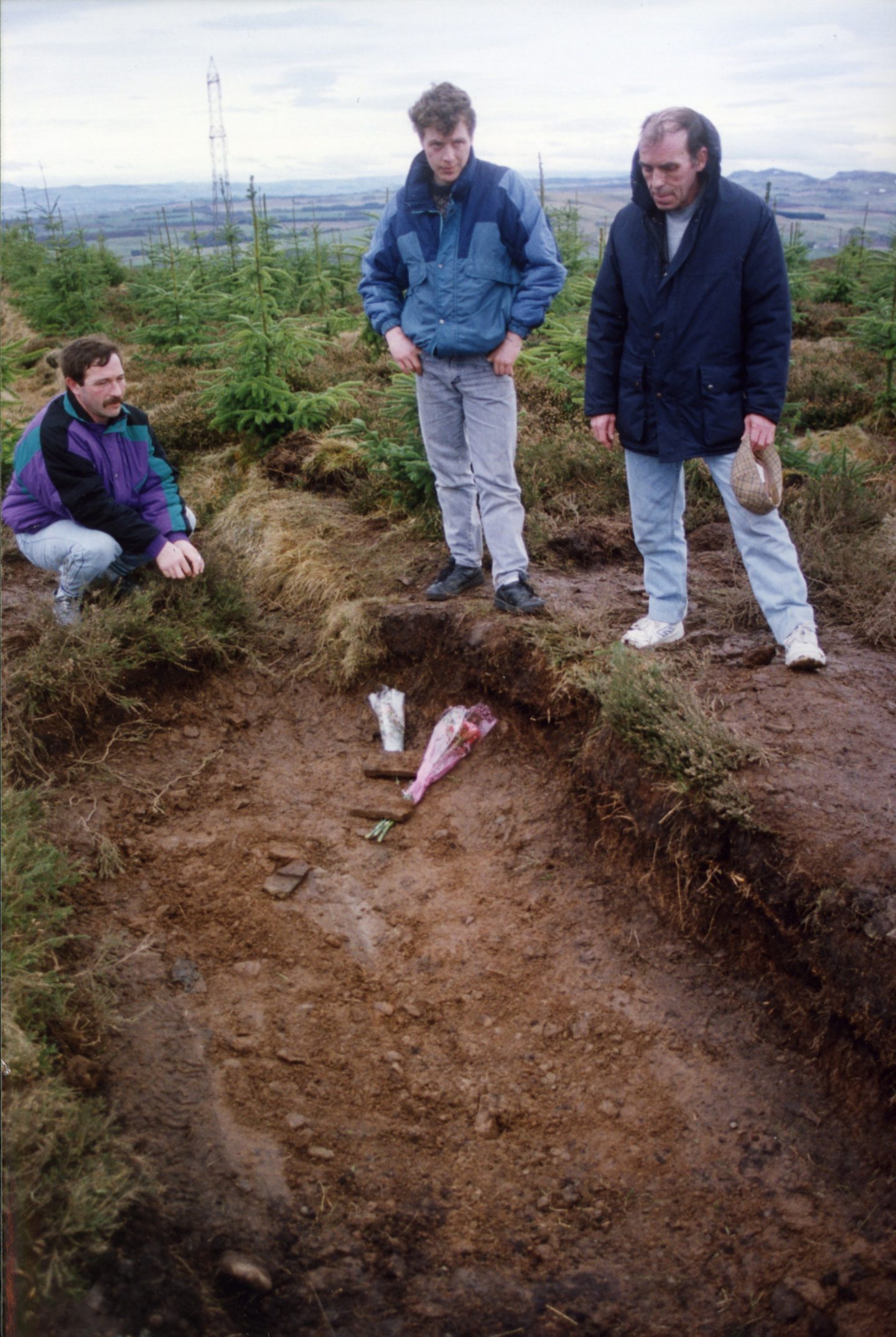 George Thomson, Rab Wilson and David Wilson visit the spot where Nealle was found. Image: DC Thomson.