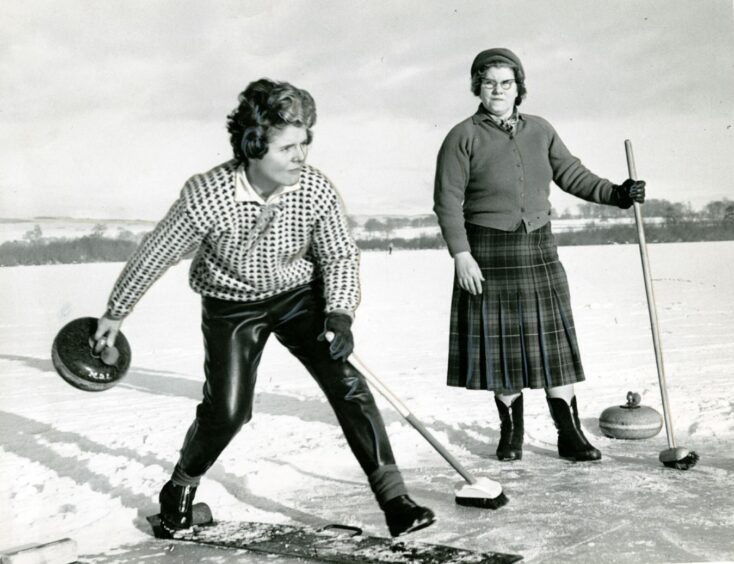 These ladies made the best of the frozen conditions with a game of curling at Coupar Angus