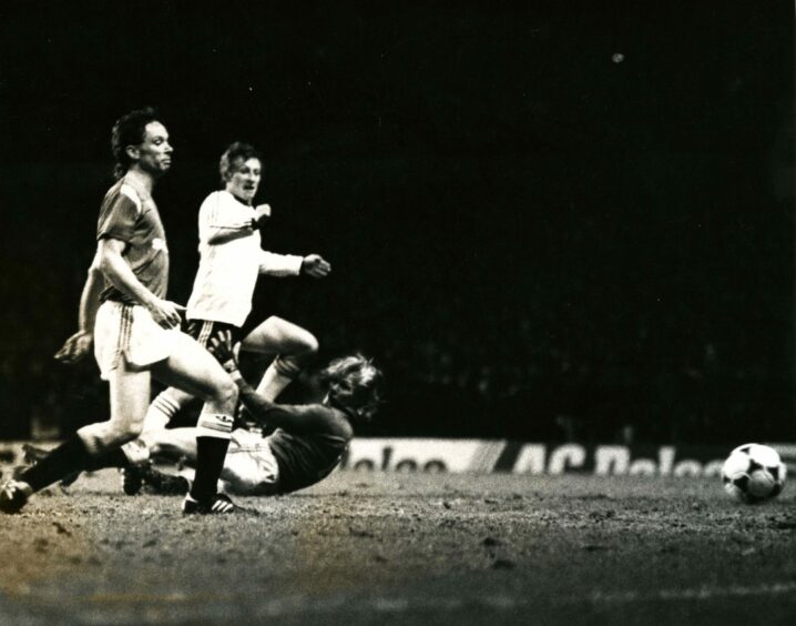 Paul Sturrock scores for United in the first leg at Old Trafford. Image: DC Thomson.
