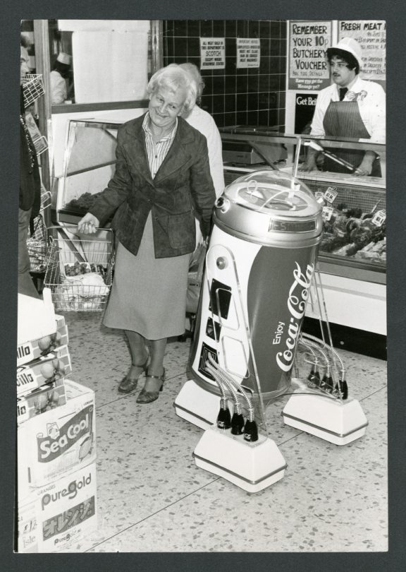 Young and old alike met Robbie the Coca-Cola Robot who was advertising the soft drink in Wm Low's, Perth Road, Dundee. Image: DC Thomson.