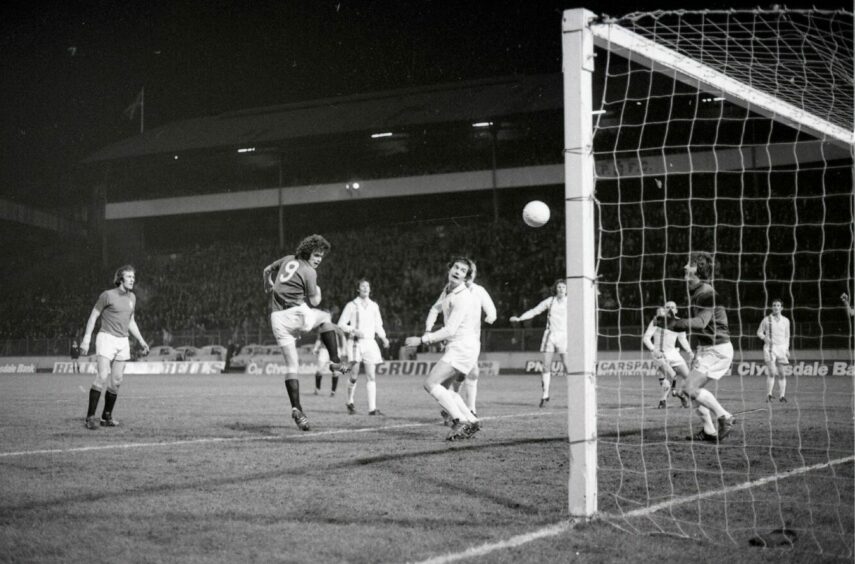 Derek Johnstone scores the first goal with a header against Forfar in the 1978 semi-final. Image: DC Thomson.