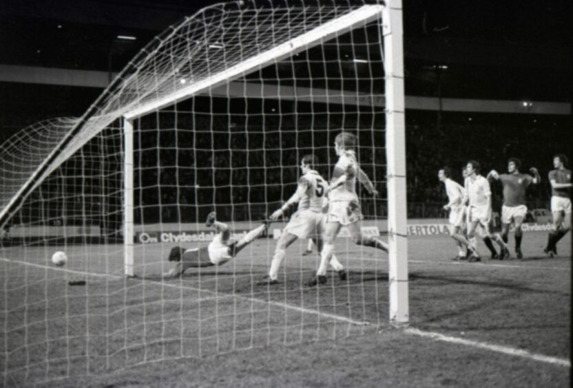 Derek Parlane breaks Forfar hearts with his 83rd-minute header. Image: DC Thomson.