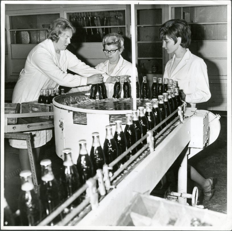 Putting the bottles into crates at the Coca-Cola plant in Clepington Road in 1968 - Betty Watson, Mary Meek and Sandra Conway. Image: DC Thomson.