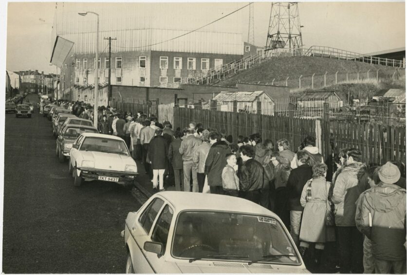 The queue stretches down Tannadice Street for tickets for the match. Image: DC Thomson.