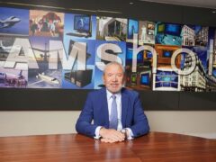Lord Sugar in the boardroom of Amshold House in Loughton, Essex (Ian West/PA)