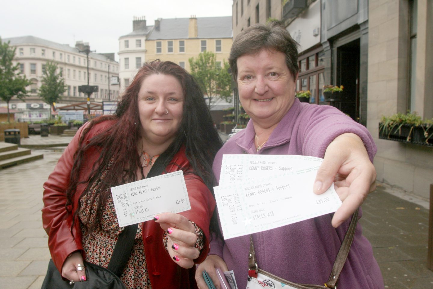 Jone Gansh and Sandra Craig of Dundee with their tickets for a Kenny Rogers concert in the city.