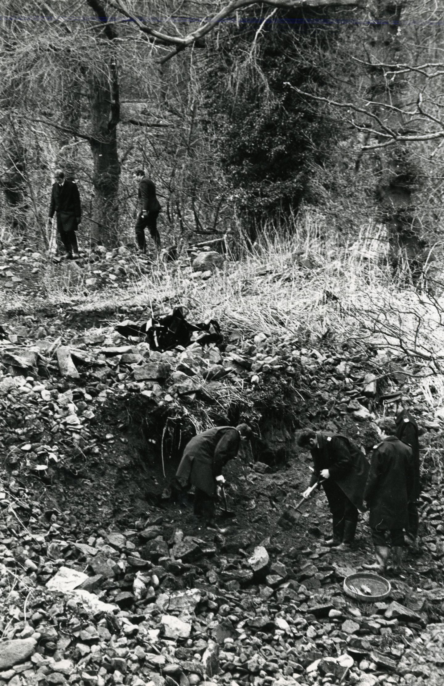 Police digging for more evidence amid the rubble. Image: DC Thomson.