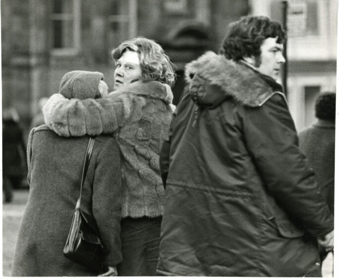 Mrs Valerie McCabe leaves the High Court in Edinburgh with her husband and friend. Image: DC Thomson.
