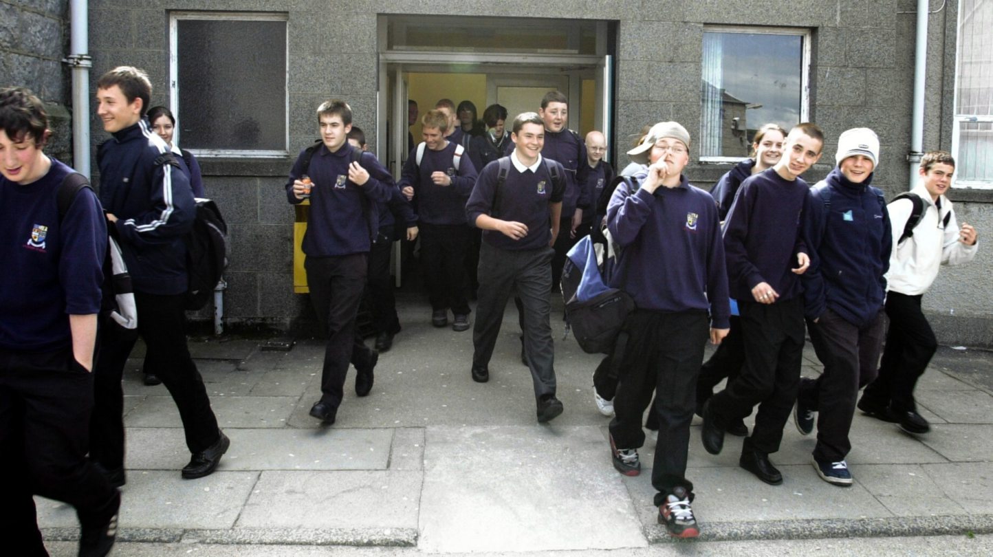 A group of Inverurie Academy pupils exiting the building.