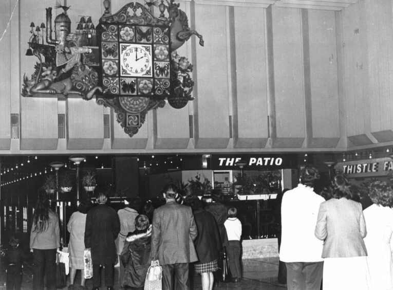 The famous Wellgate Clock has been getting admiring glances now for 45 years. Image: DC Thomson.