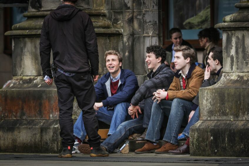 The Crown actors filming at St Salvator's Quad in St Andrews, Scotland.