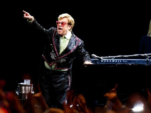Elton John performs on stage during his Farewell Yellow Brick Road show at the O2 Arena, in London (Ian West/PA)