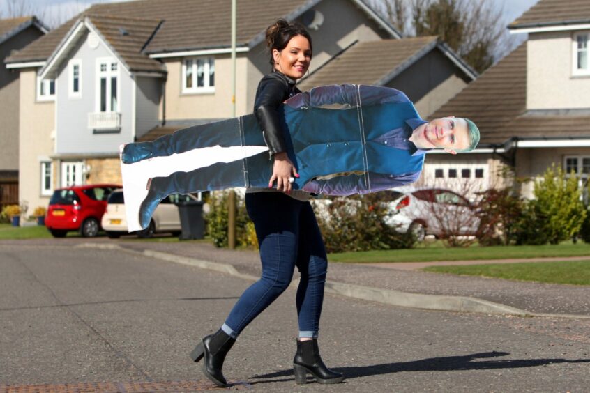 Jill with the cardboard cut-out of Gary Barlow that featured in her video of Back for Good