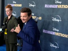 Jeremy Renner assisted by scooter at first red carpet since snowplough accident (Chris Pizzello/AP)