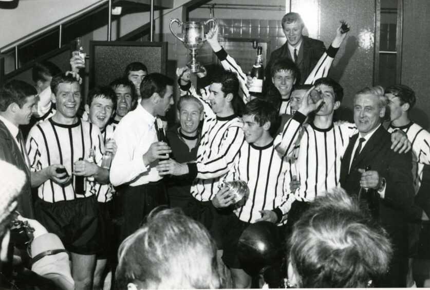 The celebrations brought the dressing-room to life at the full-time whistle. Image: DC Thomson.