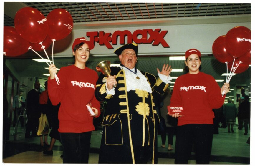 A town crier opens the new TK Maxx store in the Wellgate Centre in October 1999. Image: DC Thomson.