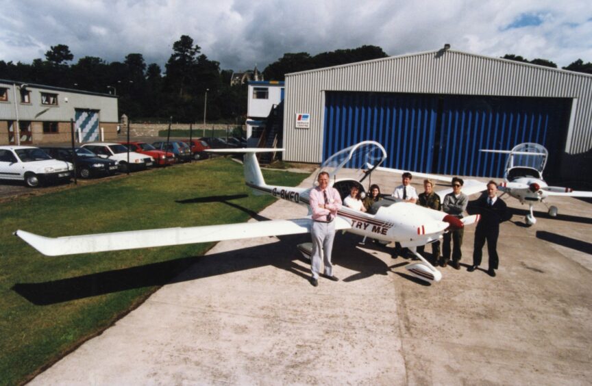 Lovat Fraser alongside new training planes at Dundee Airport for Tayside Aviation in 1995. Image: DC Thomson.