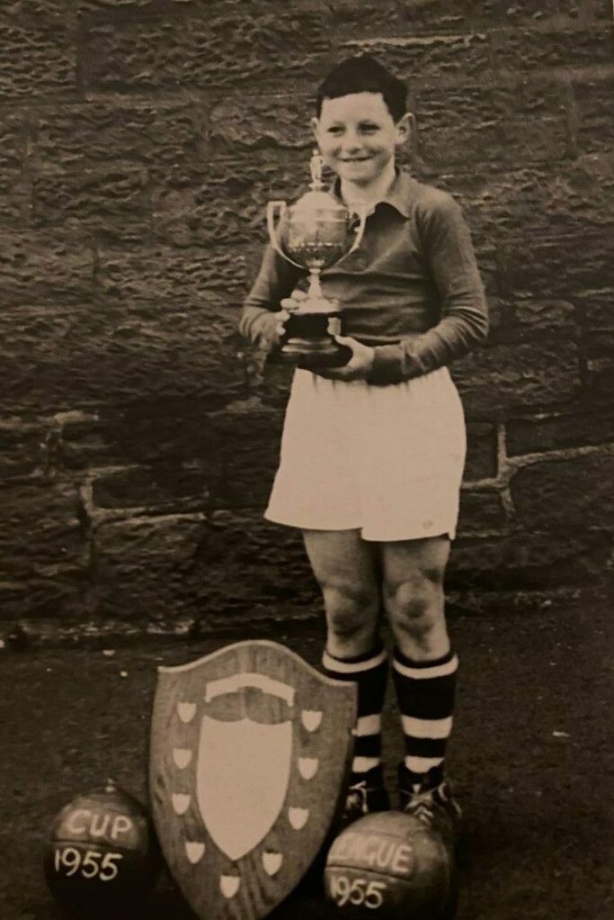 Bruce Sturrock in primary seven with his football trophies.
