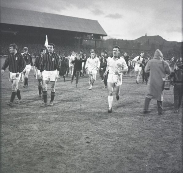 The players leave the pitch at full-time following the 1-0 win. Image: DC Thomson.