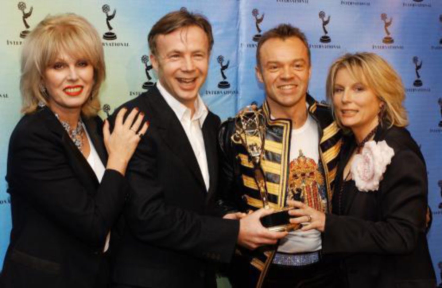 British actresses Joanna Lumley (L) and Jennifer Saunders (R), stars of "Absolutely Fabulous" pose with British talk show host Graham Norton (2nd R) and Graham Stuart (2nd L) at the 29th International Emmy Awards, in New York City. *... Norton and Stuart won the Popular Arts category with the Channel 4 show, "So Graham Norton-Show 18". Lumley and Saunders were presenters during the event. Saunders were presenters during the event.