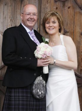 Nicola Sturgeon with her new husband Peter Murrell following their wedding service