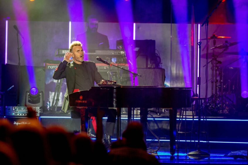 Gary Barlow gets the crowd going at the start of the Caird Hall gig back in 2018