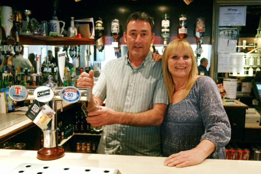 Steve and Moira Smith behind the bar in 2011. Image: DC Thomson.