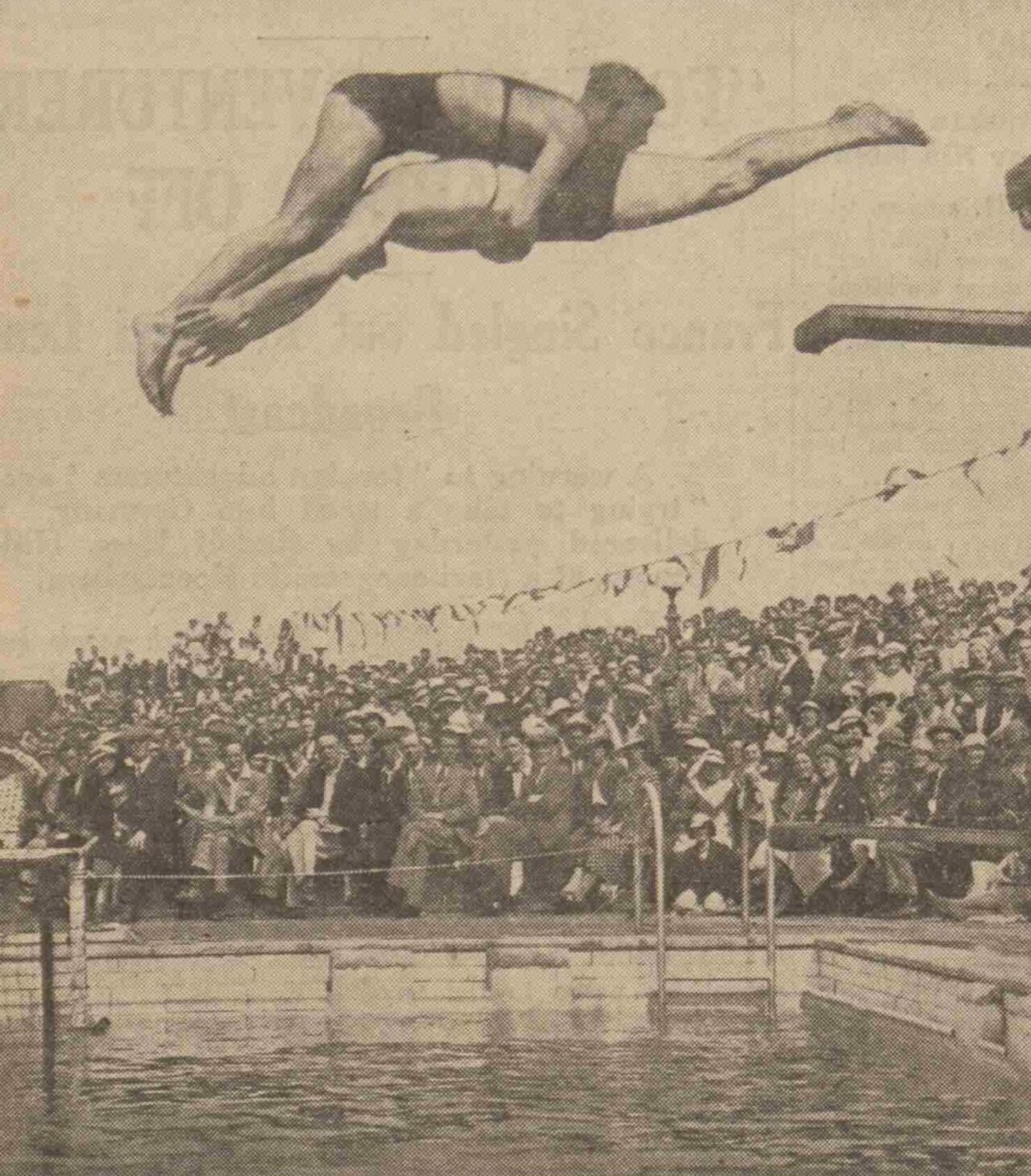 Two men in action as a diving exhibition takes place during the opening ceremony. Image: DC Thomson.