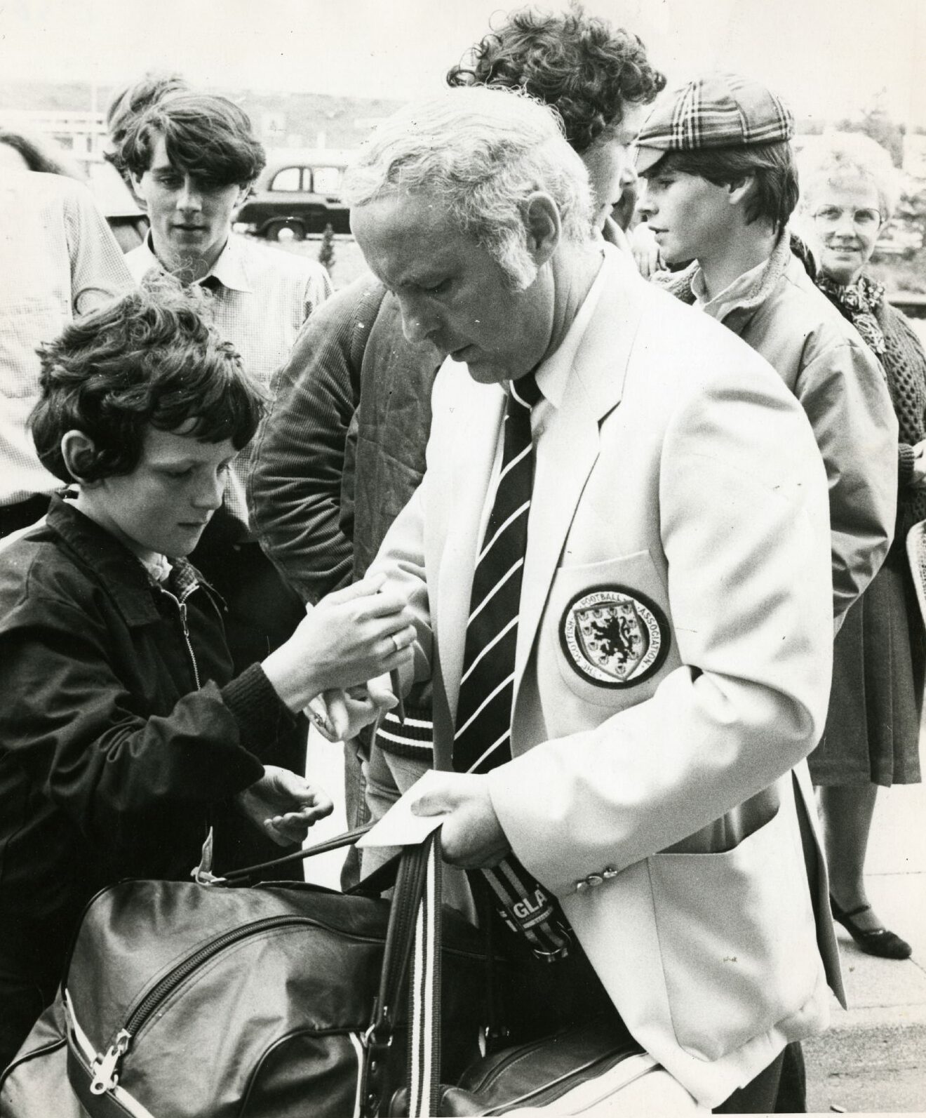 Jim Mclean signs a few autographs whilst on Scotland duty in 1983. Image: DC Thomson.